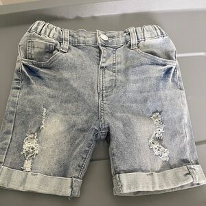 Ripped and distressed shorts